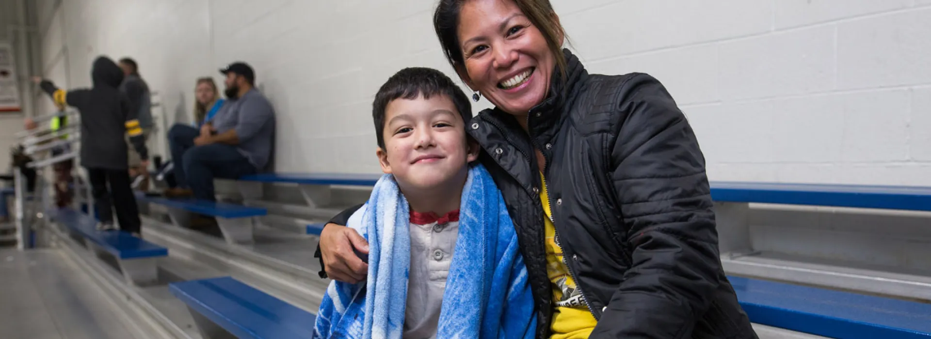Mom and son at a hockey game